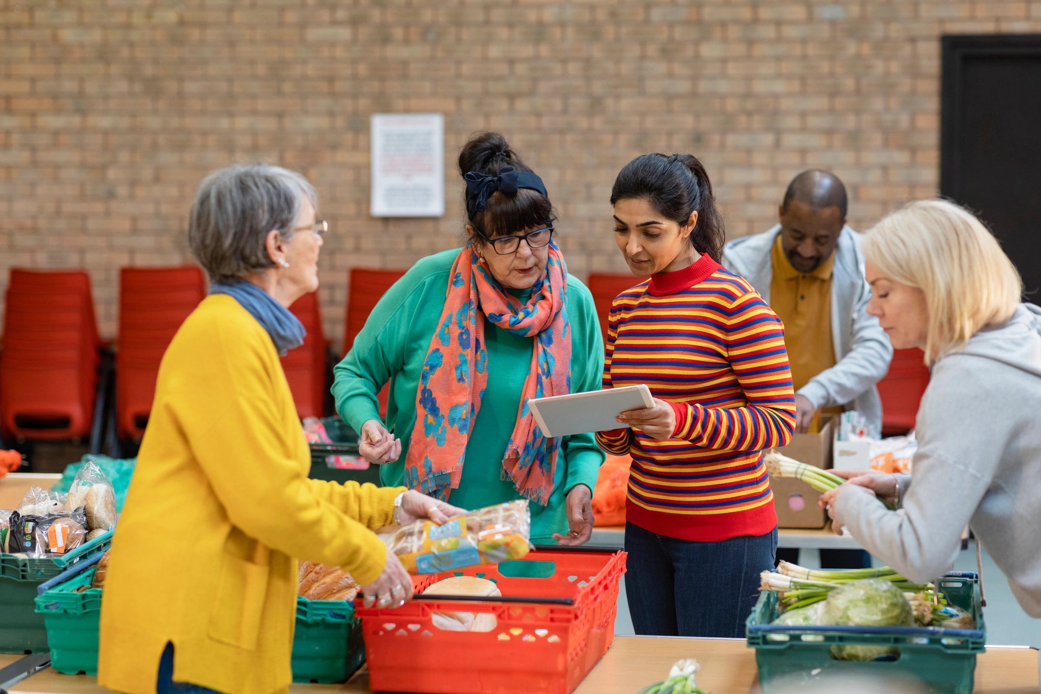 Volunteers collaborating at a charity community event