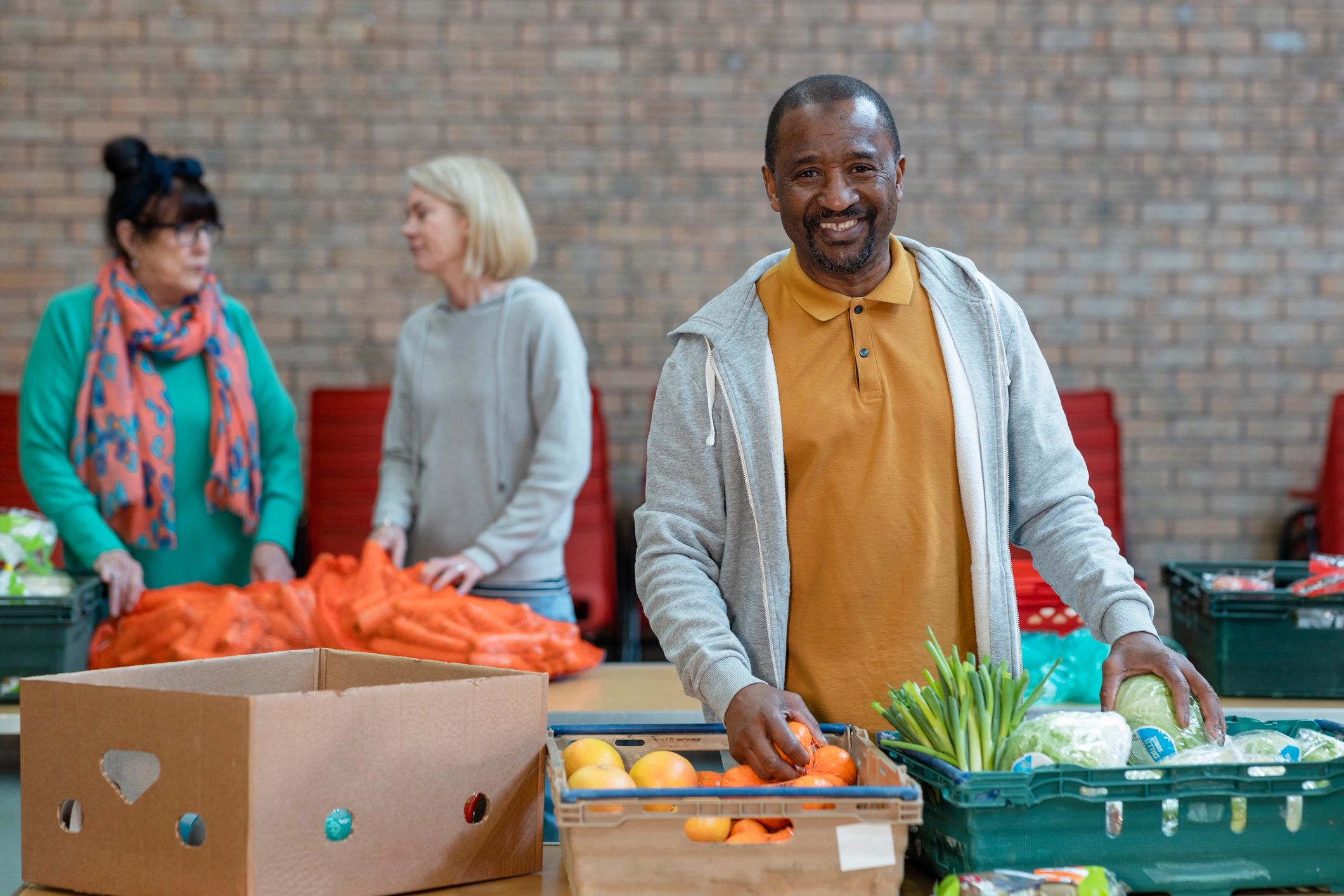 Community volunteers working together in a charity environment