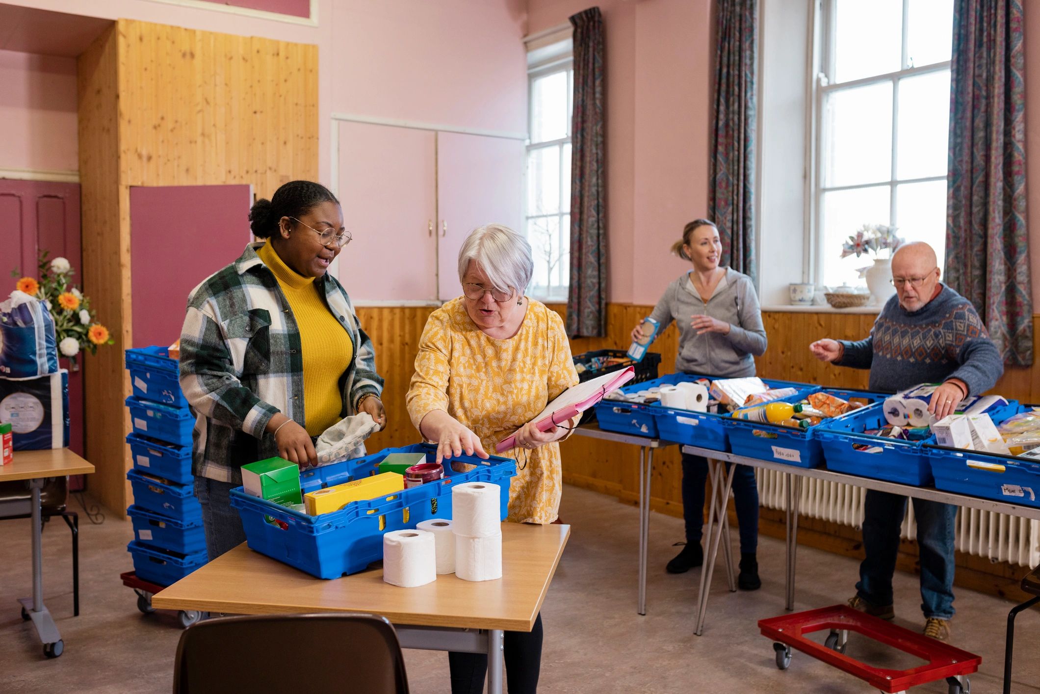 People working together in a warm community setting