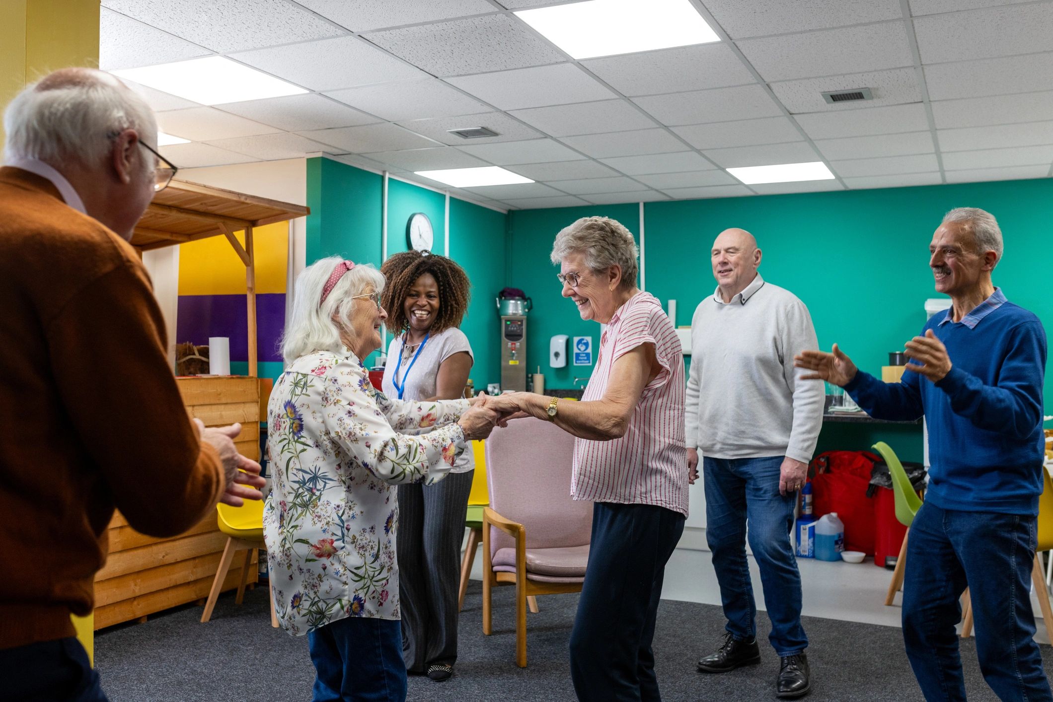 Supportive community activity led by charity volunteers
