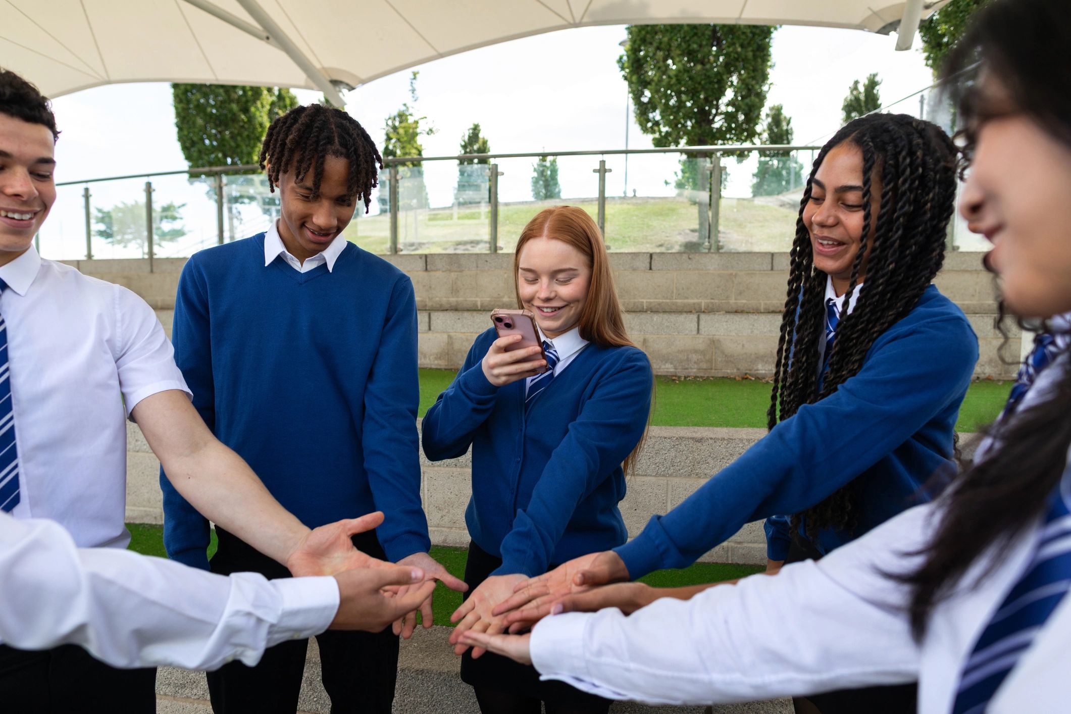 Young people gathered together in a positive community setting